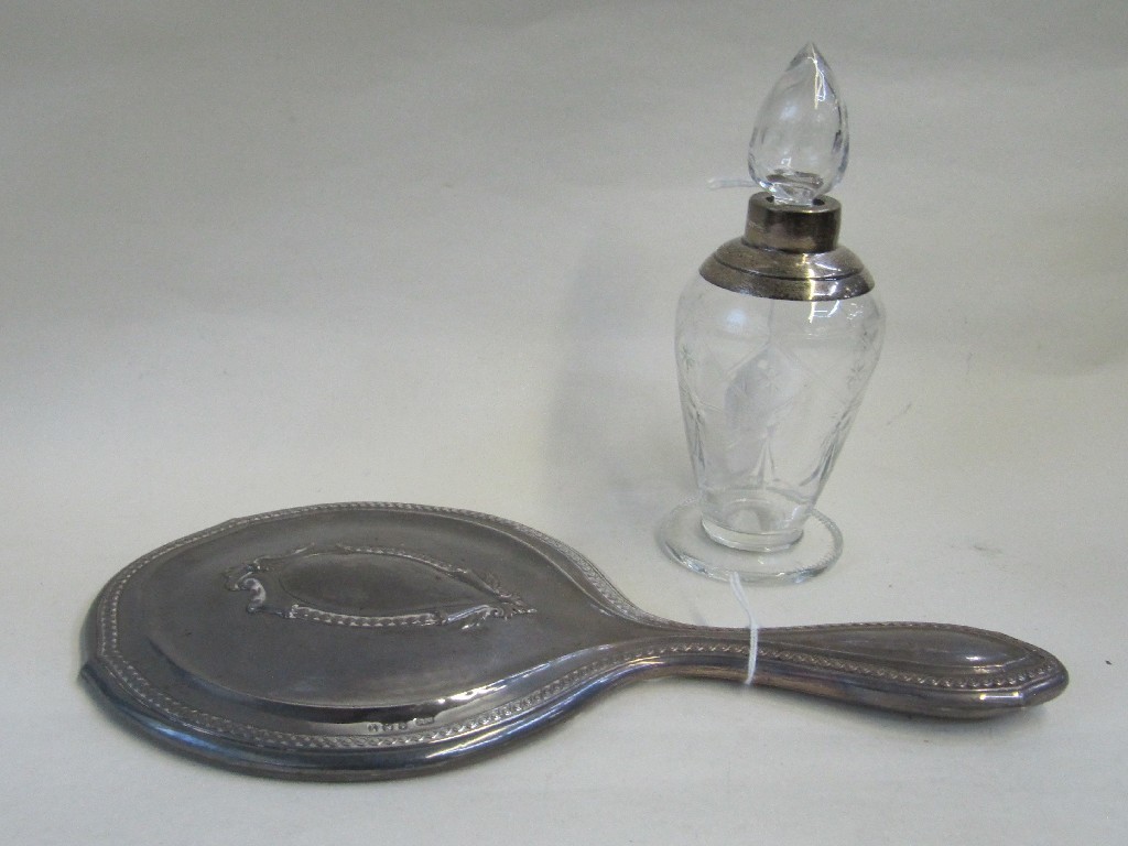 Appraisal: Lot comprising silver hand mirror and silver mounted scent bottle