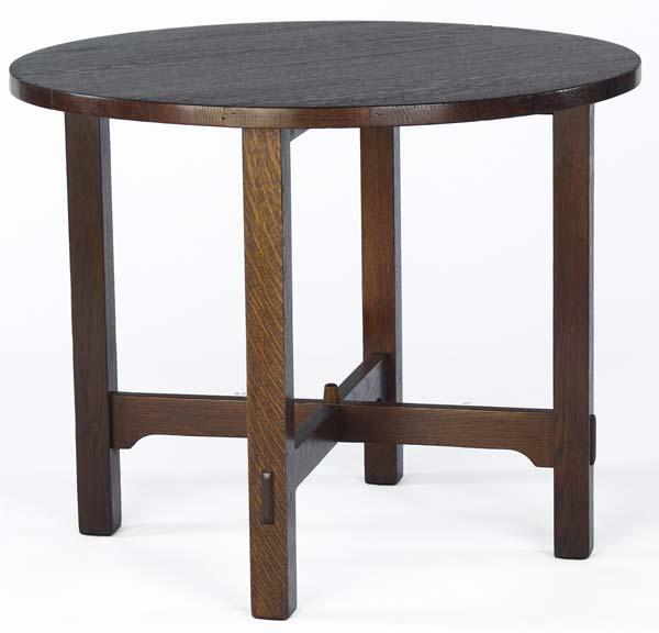 Appraisal: GUSTAV STICKLEY Lamp table with circular top and arched cross-stretchers