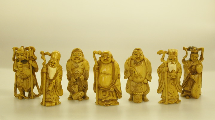 Appraisal: Group of Seven Chinese Stained Ivory Figures of Deities th