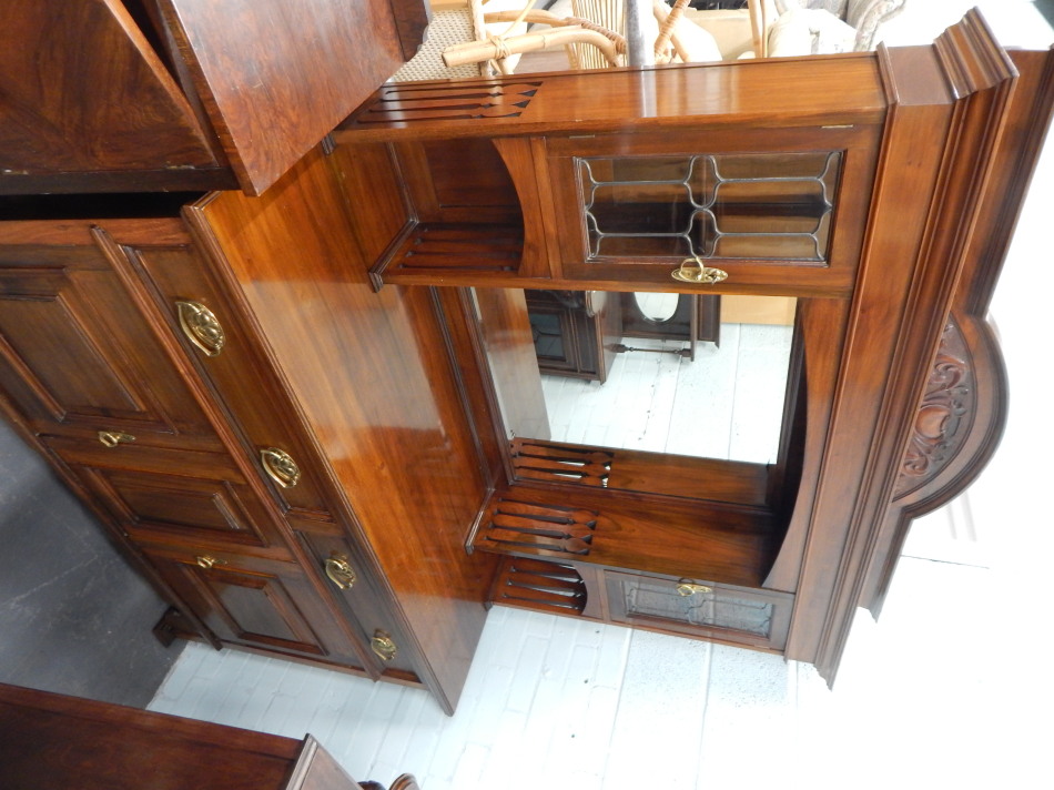 Appraisal: A late Victorian walnut dresser or sideboard the raised back