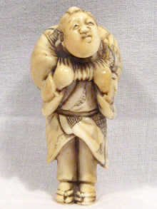 Appraisal: A Japanese ivory netsuke circa AF