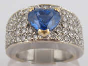 Appraisal: A white metal tests carat gold heart shaped sapphire and