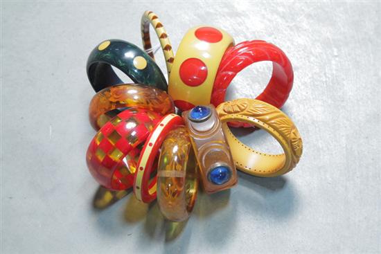 Appraisal: TEN BRACELETS Most bakelite Four with inlaid dots four carved