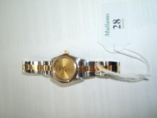 Appraisal: A ladies Rolex Oyster Perpetual wristwatch with gilt dial bezel