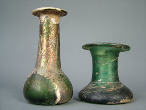 Appraisal: Two Roman iridescent green glass vases with flared rims and