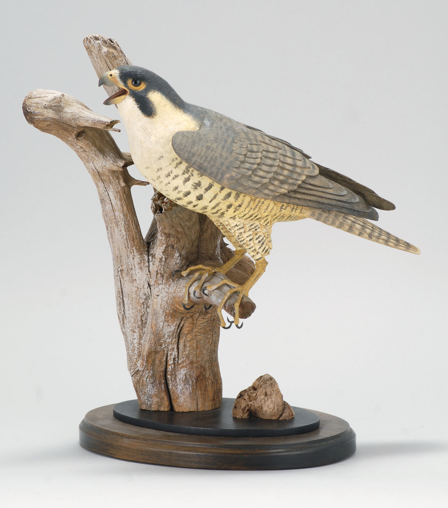 Appraisal: DECORATIVE CARVED PEREGRINE FALCON By Stan Sparre of Falmouth Massachusetts