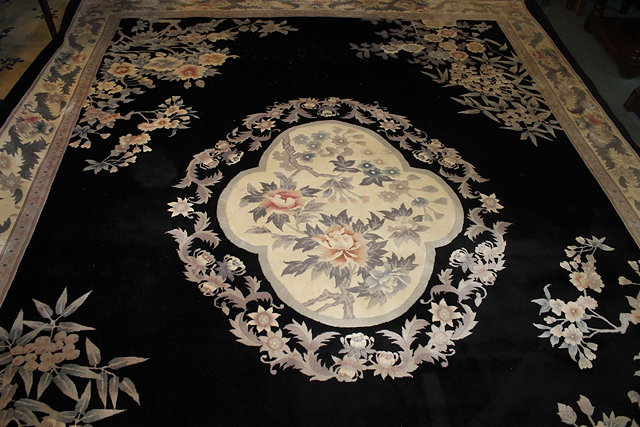 Appraisal: A SIMILAR CHINESE BLACK GROUND CARPET