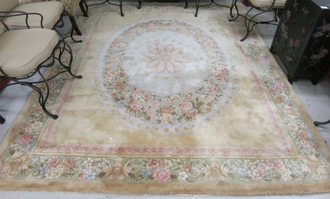 Appraisal: A CONTEMPORARY MAINLAND CHINESE CARPET central floral medallion and floral