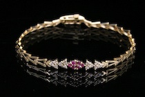 Appraisal: A Ladies' Gold Ruby and Diamond Bracelet k yellow gold