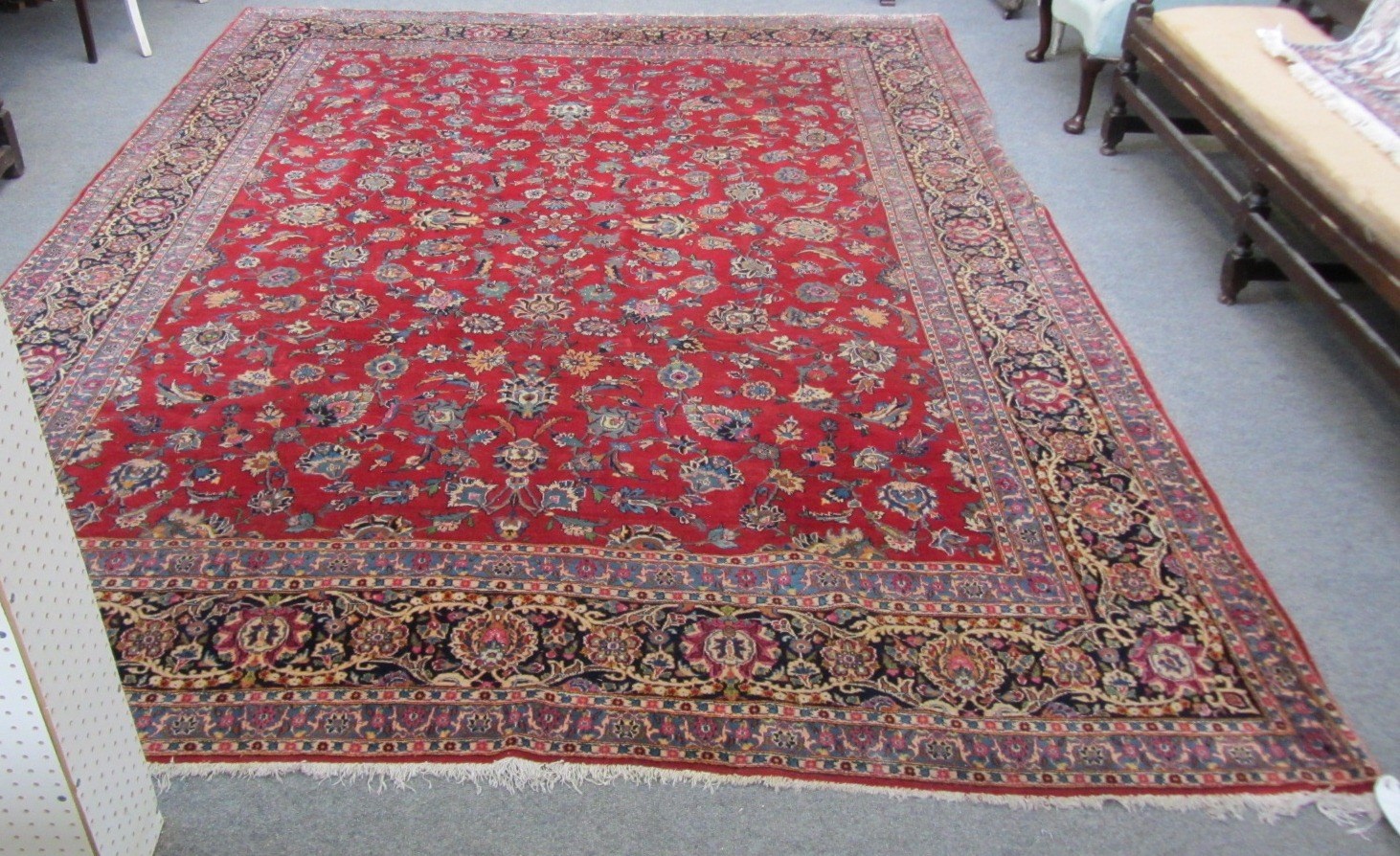 Appraisal: A Kashan carpet Persian the madder field with an allover