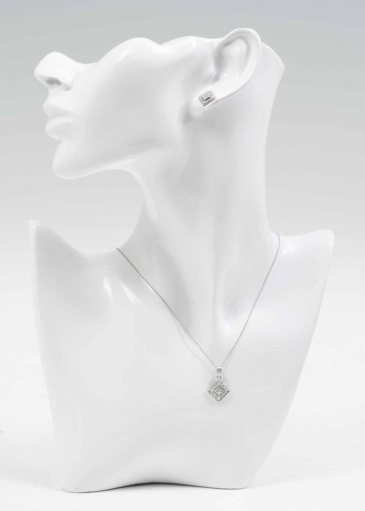 Appraisal: K DIAMOND NECKLACE MATCHING EARRINGS invisible set diamonds in the