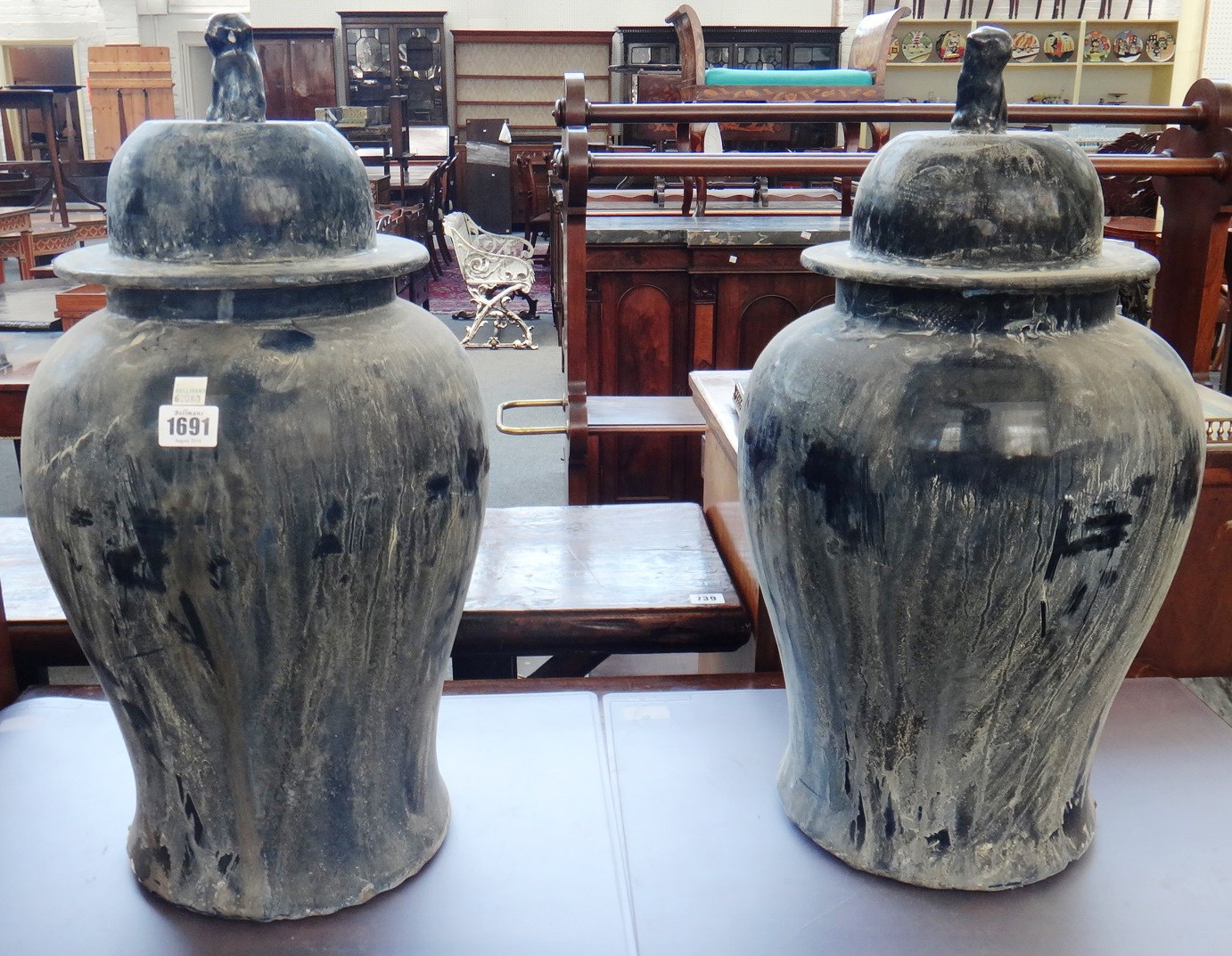 Appraisal: A pair of modern Chinese pottery blue ground vases and