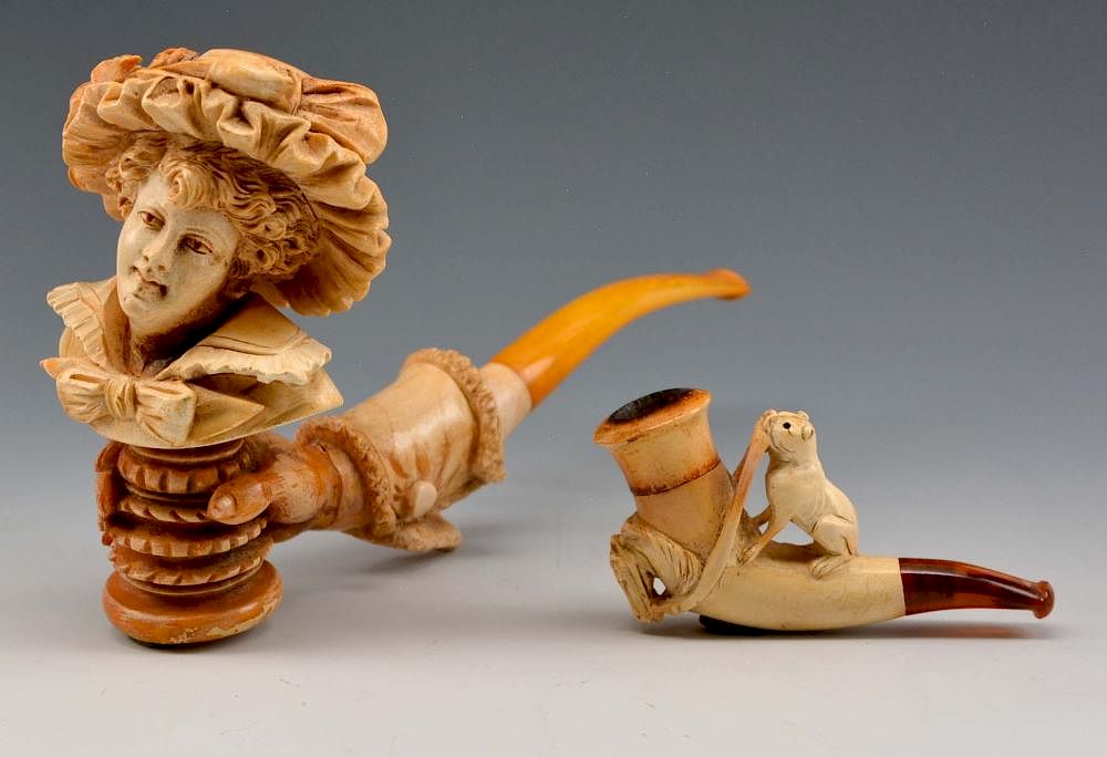 Appraisal: Grouping of two meerschaum figural pipes Grouping of two meerschaum