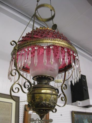 Appraisal: Cranberry Art Glass Hanging Lamp Victorian hobnail shade fancy brass