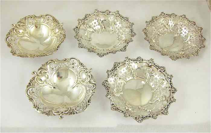 Appraisal: FIVE ENGLISH STERLING SILVER BOWLS set of footed bowls hallmarked