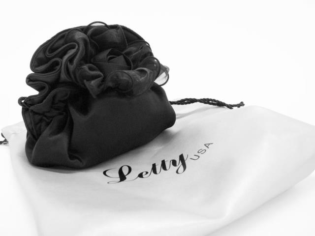 Appraisal: Letty black satin floral and ruffle evening style bag Bag