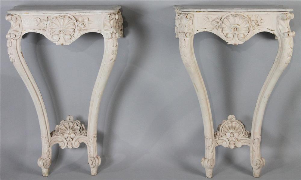 Appraisal: PAIR OF LOUIS XV STYLE MARBLE TOP SERPENTINE CONSOLE TABLES