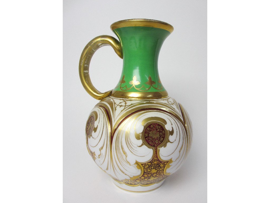 Appraisal: A Bohemian opaque overlaid glass ewer with green and gilt