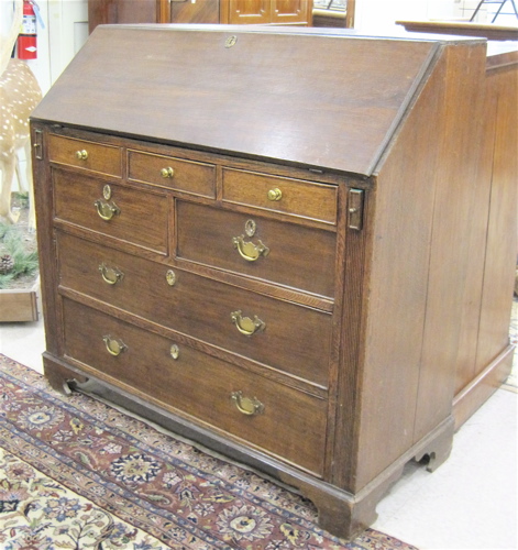 Appraisal: GEORGE III STYLE OAK SLANT-TOP SECRETARY English th century the