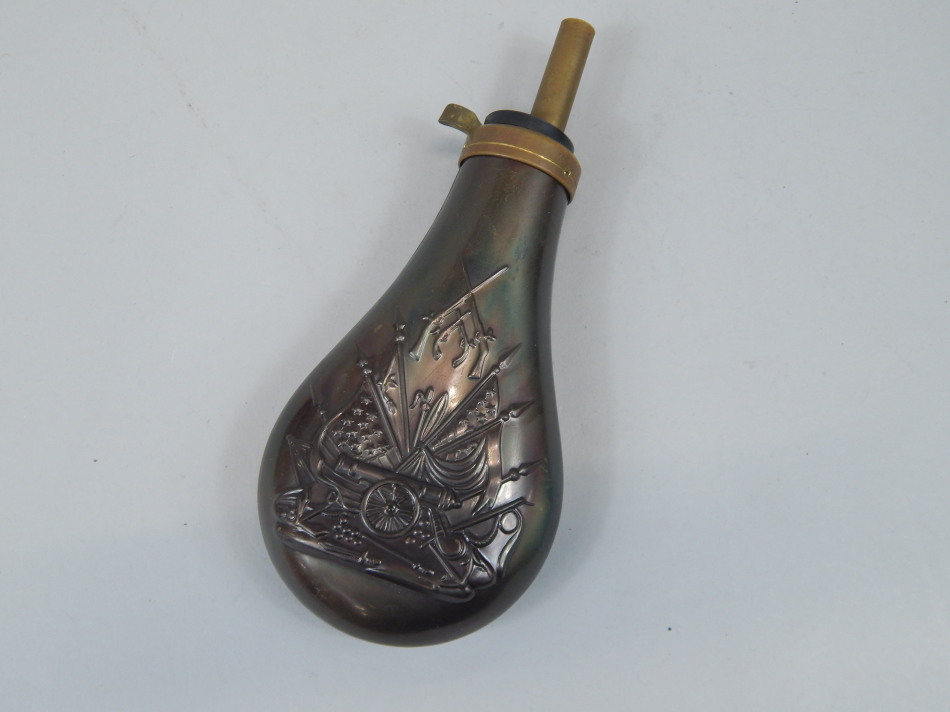 Appraisal: A bloomed copper and brass powder flask decorated with a