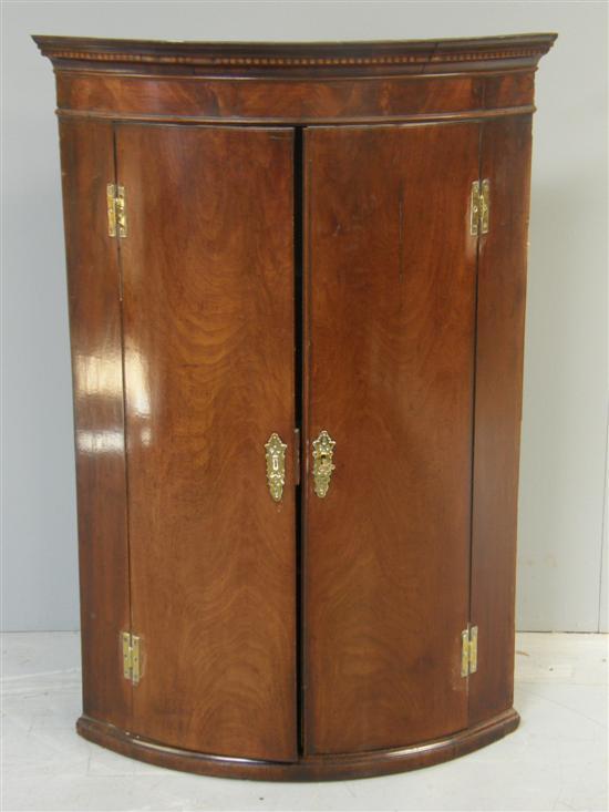 Appraisal: th century mahogany bow fronted hanging corner wall cupboard h