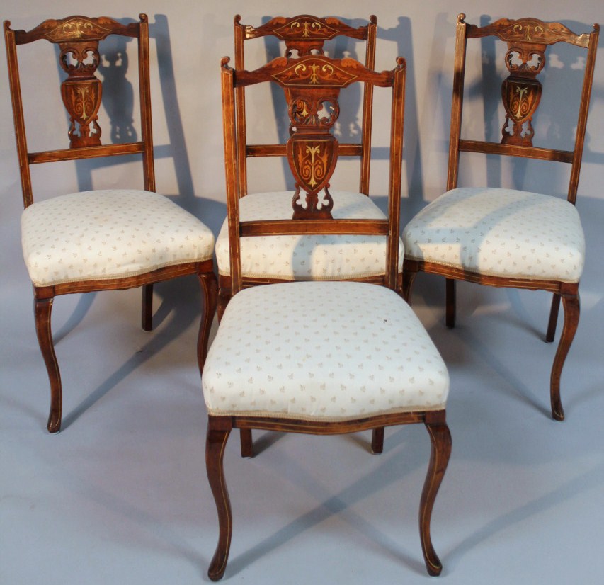 Appraisal: A set of four Edwardian mahogany bone inlaid and boxwood