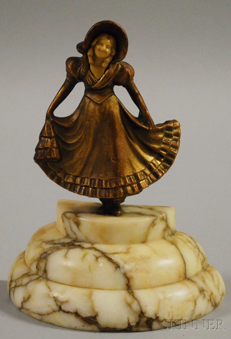 Appraisal: Bronzed Metal and Marble Figural Doorstop depicting a young girl