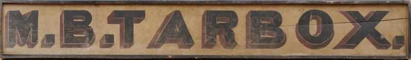 Appraisal: AMERICAN PAINTED WOOD TRADE SIGN The rectangular molded panel inscribed