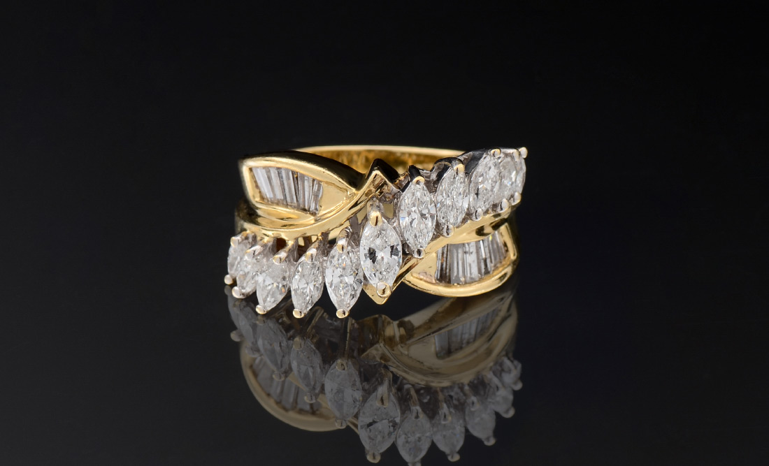 Appraisal: DIAMOND COCKTAIL RING CA 'S k yellow gold ring with