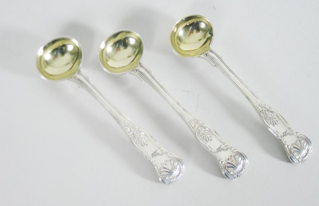 Appraisal: Three Victorian Salt Spoons Kings pattern engraved with crests Exeter