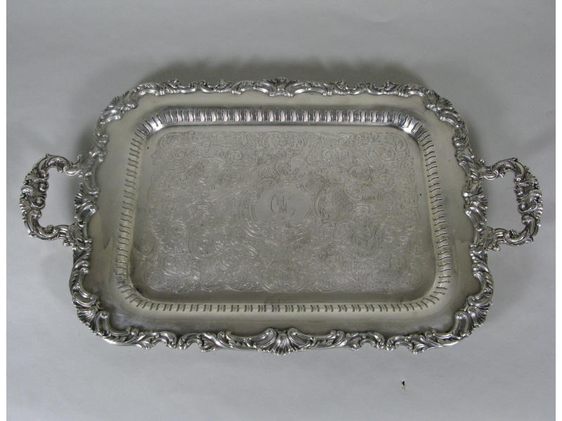 Appraisal: Silverplate Waiter cast and applied rococo border and handles with