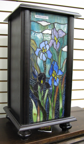 Appraisal: A DARK WOOD AND STAINED GLASS DISPLAY PEDESTAL The square