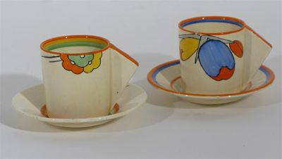 Appraisal: Flora' a Clarice Cliff Bizarre Conical coffee can and saucer