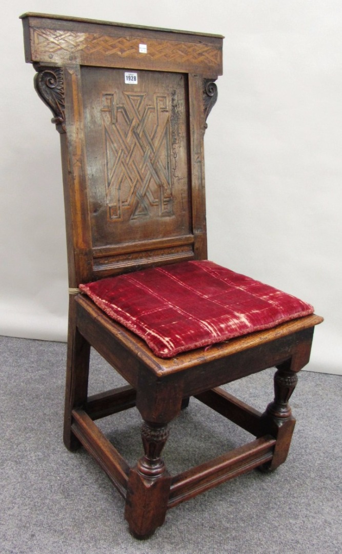 Appraisal: A mid th century French parquetry inlaid panel back chair