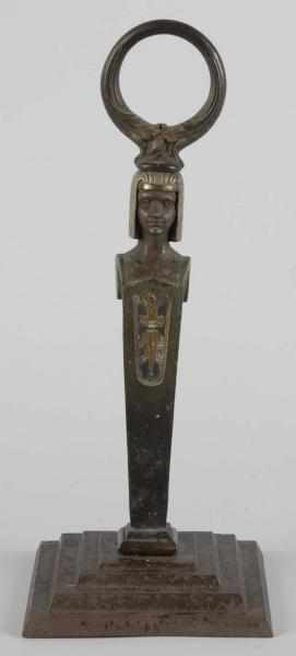 Appraisal: Cast Iron Egyptian on Pyramid Base Doorstop Description Porter doorstop