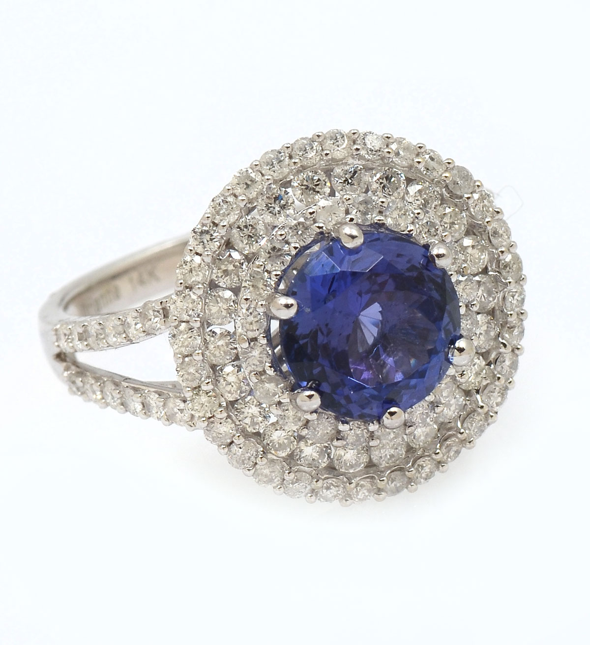 Appraisal: K CT TANZANITE DIAMOND RING CT round mixed cut tanzanite