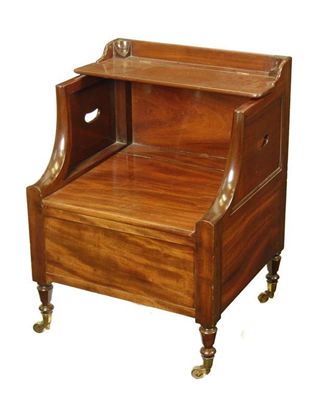 Appraisal: An early th century mahogany commode stool with a hinged