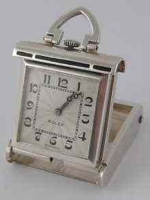 Appraisal: A silver and black enamel sports or purse watch by