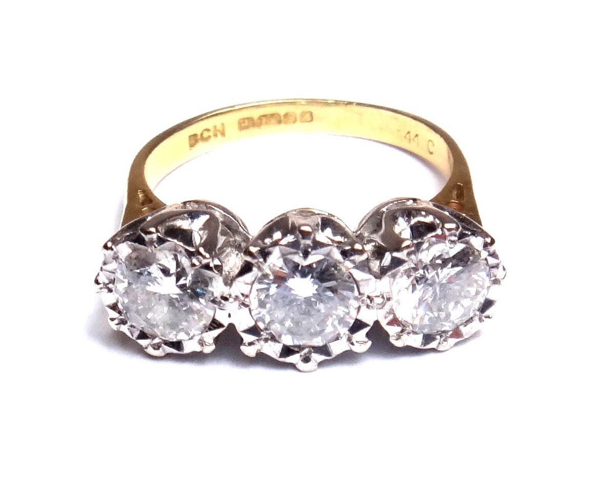 Appraisal: An ct gold and diamond set three stone ring mounted