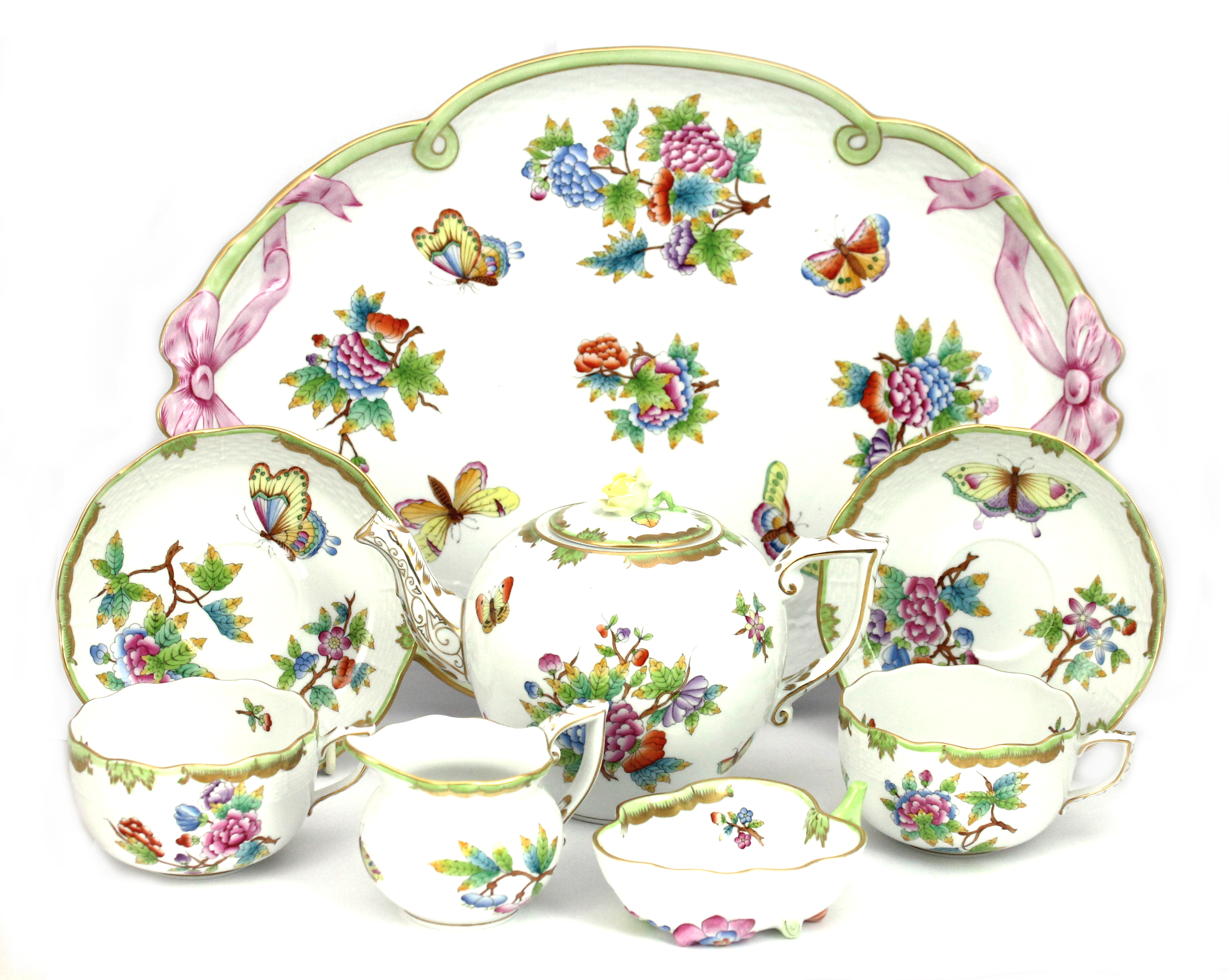 Appraisal: A Herend porcelain tete a tete decorated with flowers and