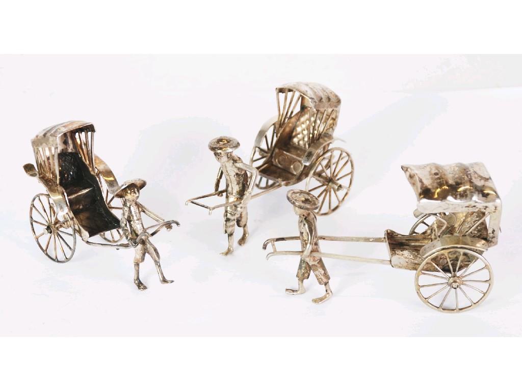 Appraisal: FIVE CHINESE SILVER COLOURED METAL MINIATURE MODELS OF RICKSHAWS with