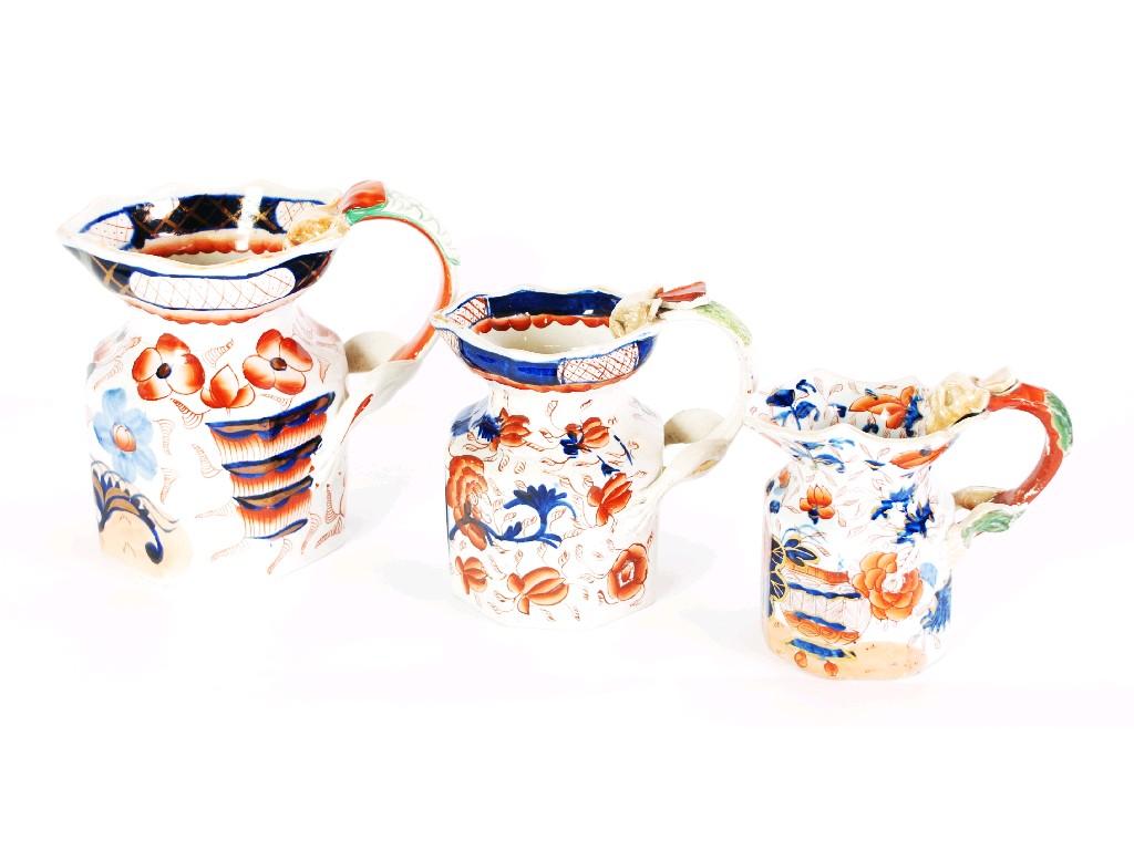 Appraisal: GRADUATED SET OF THREE TH CENTURY 'IRONSTONE CHINA' IMARI JUGS