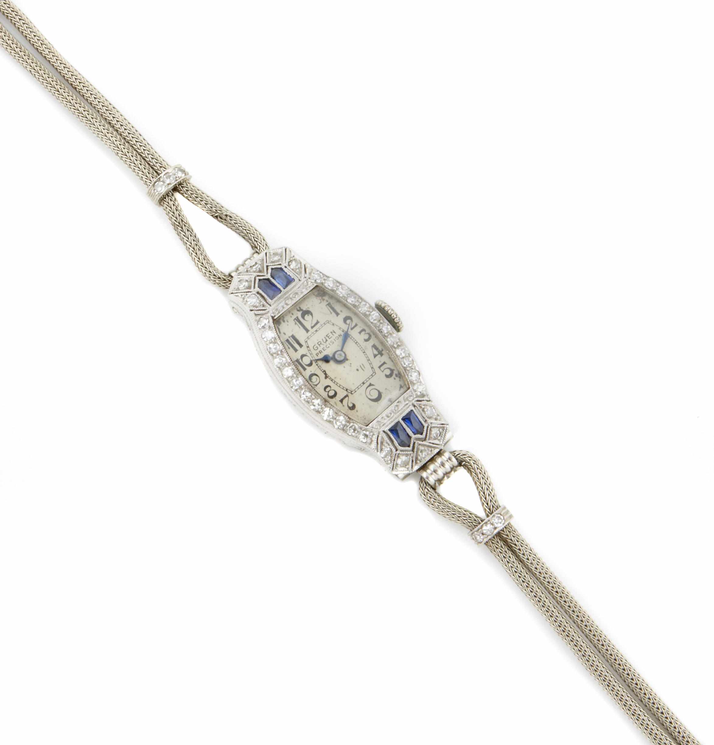 Appraisal: An Art Deco diamond synthetic sapphire and platinum wristwatch with