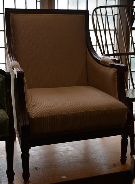 Appraisal: A contemporary hardwood framed armchairwith corduroy upholstery