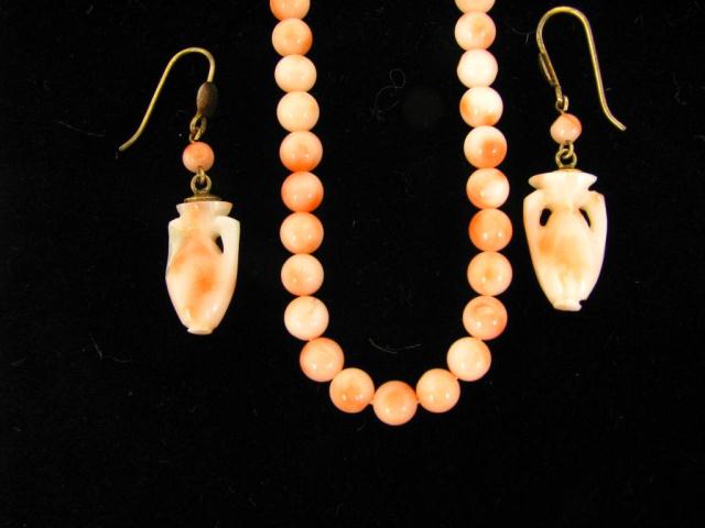 Appraisal: Coral bead necklace '' and complimentary urn motif pierced dangle