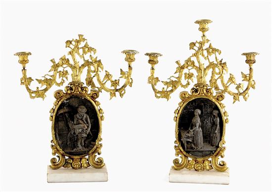 Appraisal: Pair parcel-gilt three-light candleholders circa three bobeches supported on stylized