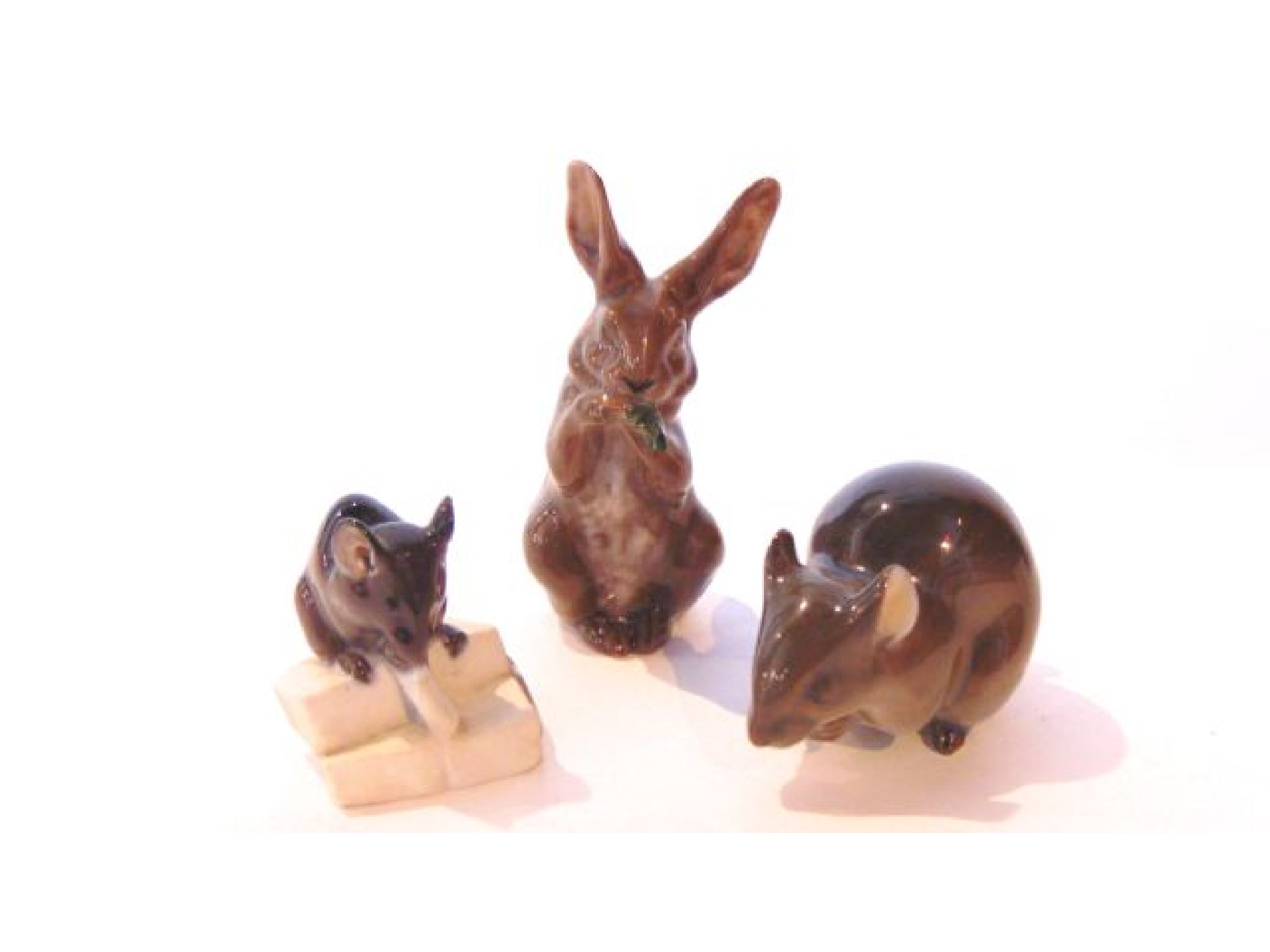 Appraisal: A collection of three Royal Copenhagen figures of a rabbit