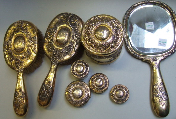 Appraisal: A Sterling silver and gilt eight piece part dressing set