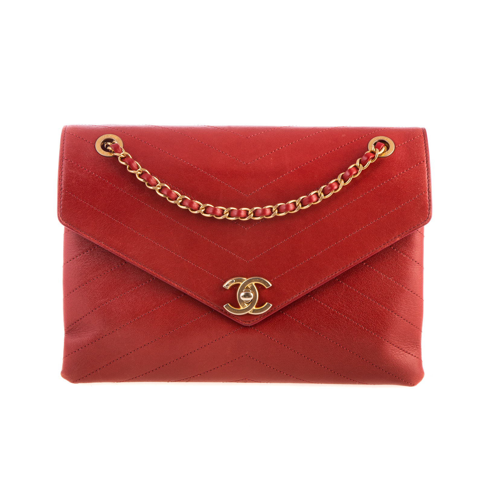 Appraisal: A CHANEL CHEVRON ENVELOPE FLAP BAG A red chevron pattern