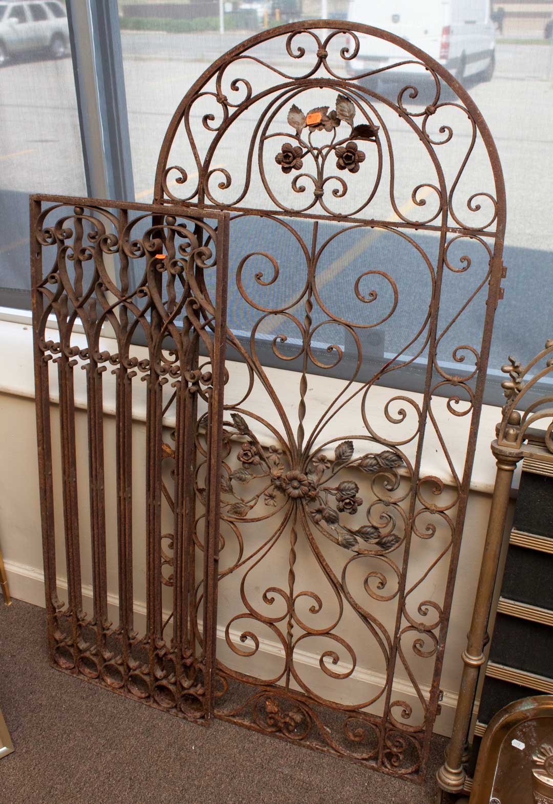 Appraisal: Two wrought iron fence sections